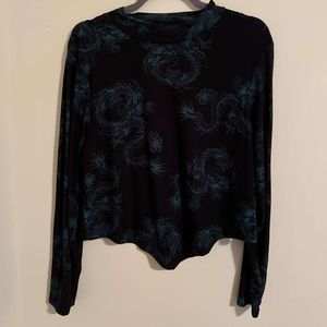 Rue21 Top Black w/ Green dragon all over print.